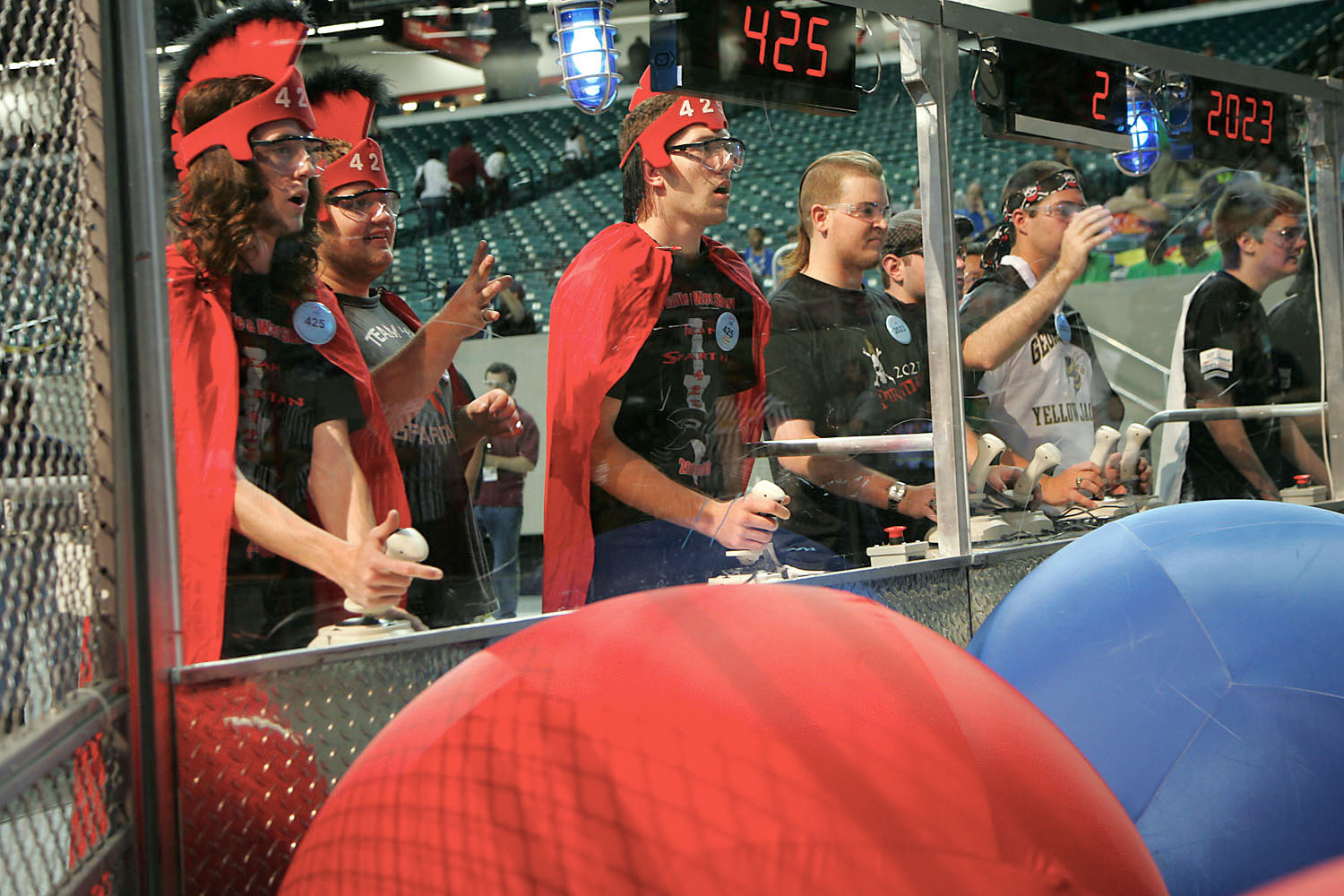 The Spartans of Melbourne, FL, remote controlling their robot.